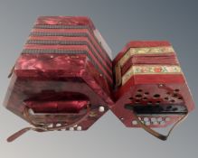 A vintage Italian Bastari 20 key concertina together with a further vintage German 20 key
