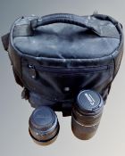A camera bag together with a Canon ultrasonic zoom EF 75 - 300mm lens and a Sigma UC zoom 28 - 70mm