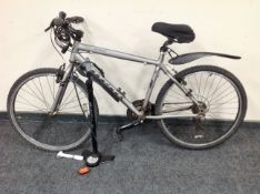 A Ridgeback Bora mountain bike with pump lights and bike locks.