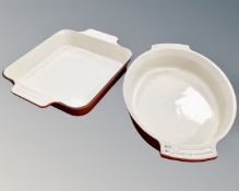 A cast iron Le Creuset oven dish together with a further ceramic oven dish.