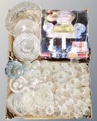 Two boxes containing a large quantity of assorted glassware including drinking vessels, vases,