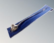 A silver plated candle snuffer by S. G. of Sheffield, in cloth bag.