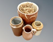 Four pieces of antique earthenware including crockpot, two storage jars and a jug.