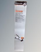 A Magnusson laminate and vinyl cutter, boxed.