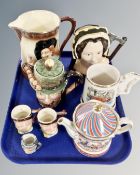 A tray containing an oversized Jolly Good Health Toby jug,