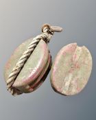 Two vintage winch blocks.