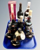 A tray containing ten bottles of alcohol including Mateus wine, liqueurs, Pimms, Taylors port etc.