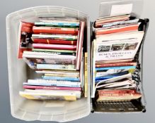 Two boxes of books relating to busses, trolleys and trams.