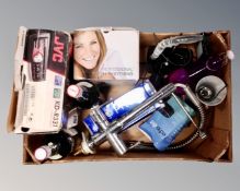 A box containing an angle poise lamp, kitchen mixer tap, Pimms professional teeth whitening kit,