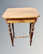 A continental beech and walnut sewing table.