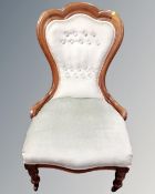 A Victorian mahogany nursing chair
