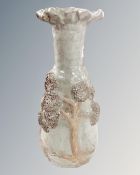 An S. Hollingsworth studio pottery vase decorated with trees.