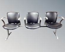 A contemporary Orlando chrome and black vinyl three seat hall bench.