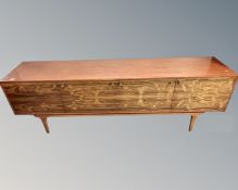 A mid 20th century Everest Furniture teak and rosewood four door low cocktail sideboard