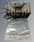 A fabric pet carrier, as new, together with a Mirand camera bag containing handbags and purses.