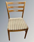 A set of four Scandinavian teak dining chairs.