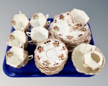 A tray containing an antique Melba china tea service.