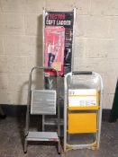 An aluminium 3 section loft ladder (as new) and two pairs of twin steps ladders (one sealed)