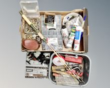 A box containing plastic storage boxes and organizers containing socket set pieces, screws, bolts,