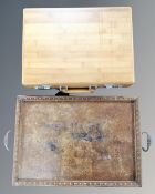 An oak serving tray with brass handles bearing the crest of St.