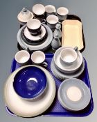 Two trays containing a quantity of assorted Denby dinnerware.