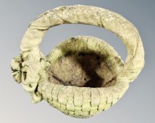 A Contrite garden planter in the form of a basket