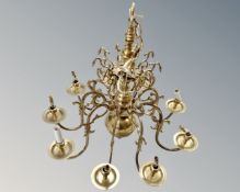 A decorative continental brass eight way chandelier
