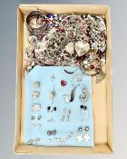 A collection of costume jewellery, white metal chains,