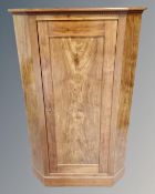A 19th century Scandinavian panelled corner cabinet