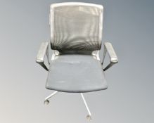 A Geprufte Sicherheit Vitra metal framed fabric and mesh upholstered swivel office armchair