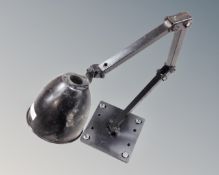 A mid 20th century industrial angle poise lamp