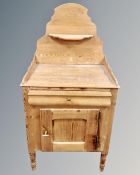 An antique pine wash stand