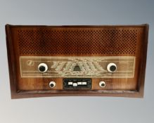 A mid 20th century Minerva teak cased valve radio (continental wiring)