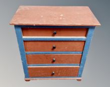 A 19th century painted pine four drawer chest