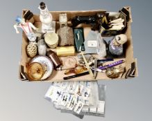 A box of cigarette cards, drawing instruments, plated cutlery, ornaments, glass ware,