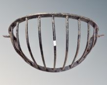 A vintage cast iron hay rack