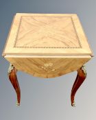 A French inlaid flap sided occasional table