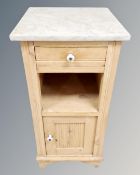 A pine marble topped pot cupboard