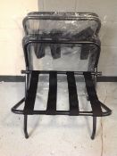 Three contemporary Bolero folding metal luggage stands