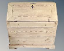 A 19th century Scandinavian pine bureau with three drawers