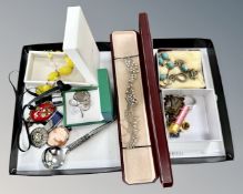 An antique style pendant on ribbon, together with Sterling silver necklace set with turquoise,