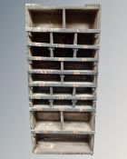 A set of vintage pigeon hole shelves,