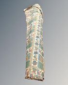 A roll of upholster's fabric