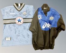 A Newcastle United 1996/97 football shirt bearing team signatures together with a further Newcastle