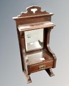 An Edwardian mahogany mirror