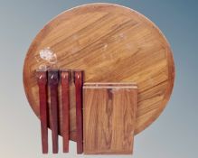A Scandinavian rosewood veneered circular extending dining table with two leaves (Af)