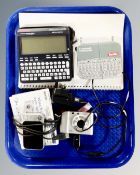 A tray of Berlitz nine language translator together with a Franklin language master,