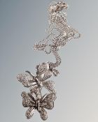 A 9ct white gold necklace with two butterflies pendant, 5g.