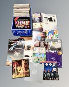 A crate of vinyl records - UB40, The Cure, Boston, The Eagles, John Lennon,