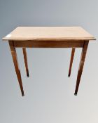 An Edwardian mahogany occasional table